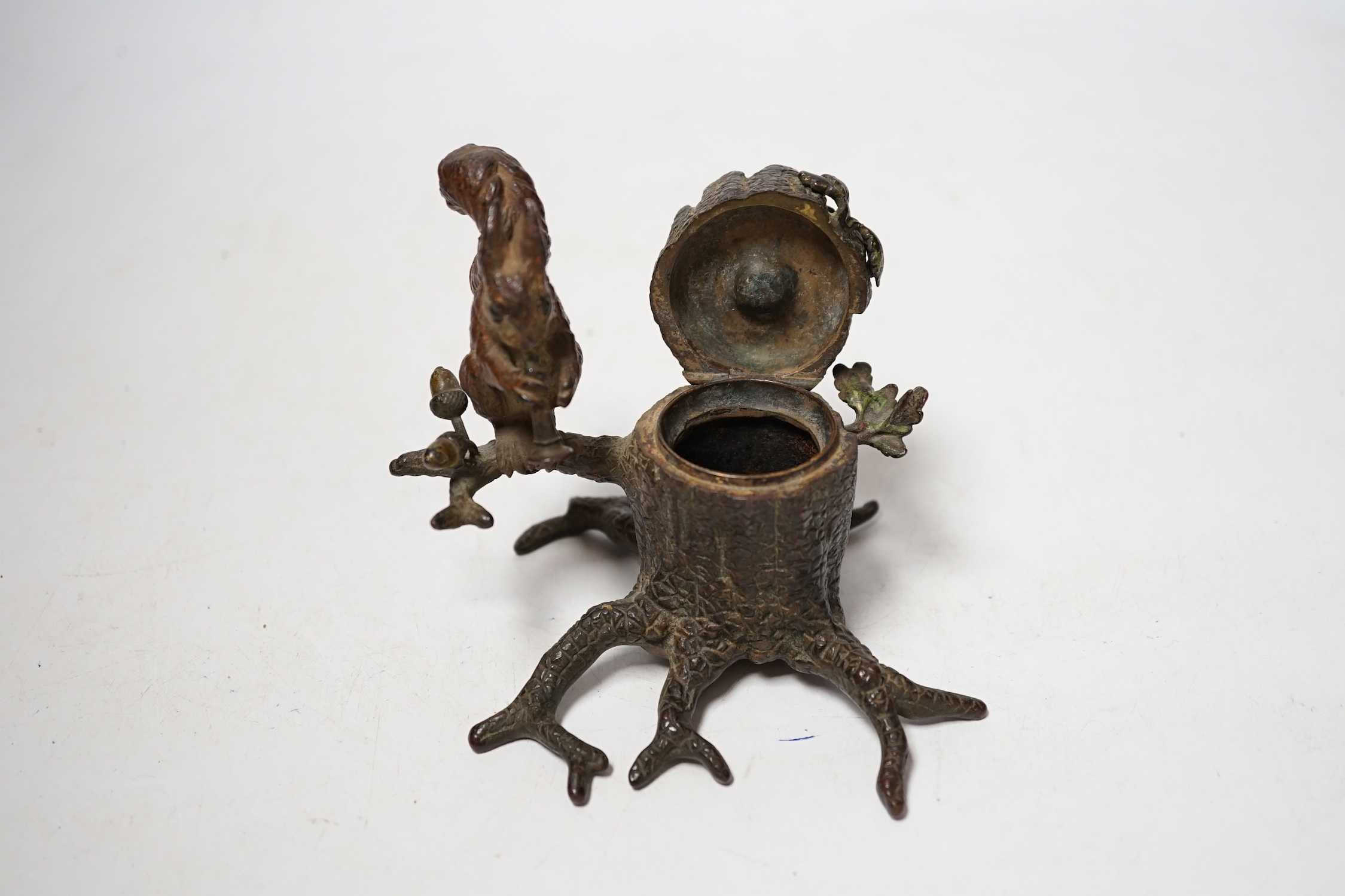 A cold painted bronze inkwell with squirrel, marked ‘Guschutzt’, 10cm